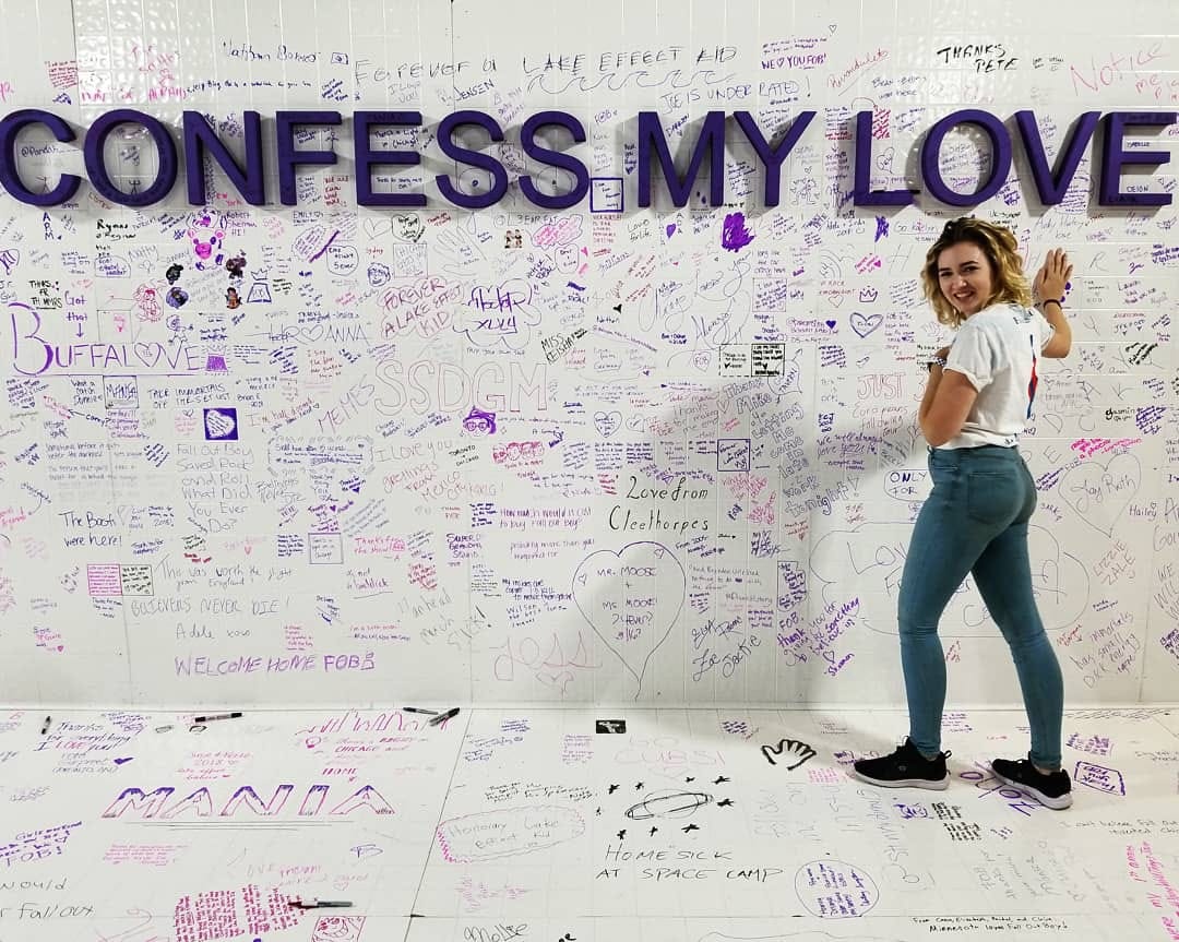 Madison seemingly laughing at a wall